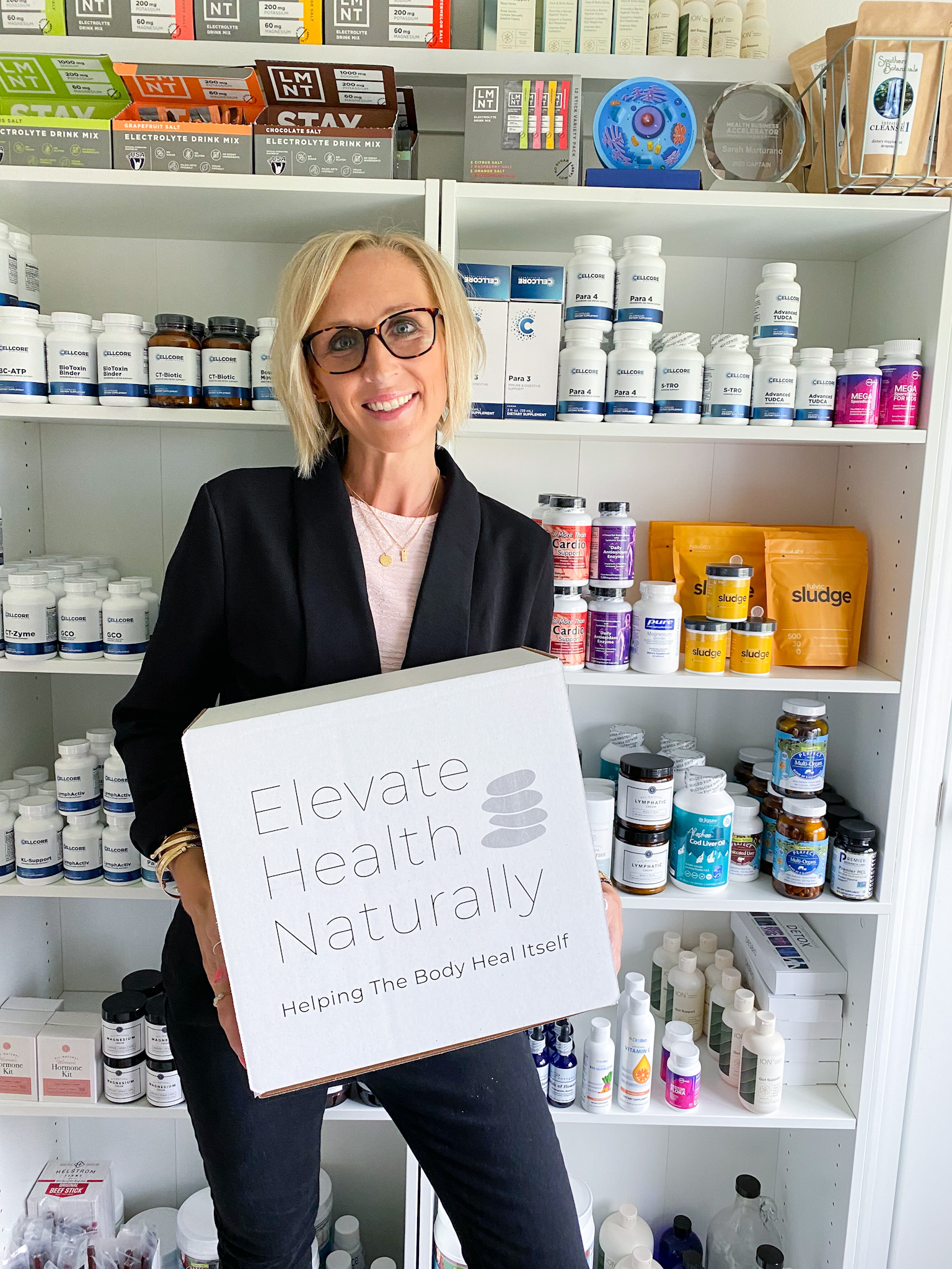 Sarah holding program box