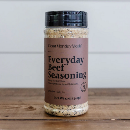 Everyday Beef Seasoning bottle by Clean Monday Meals on a kitchen counter.