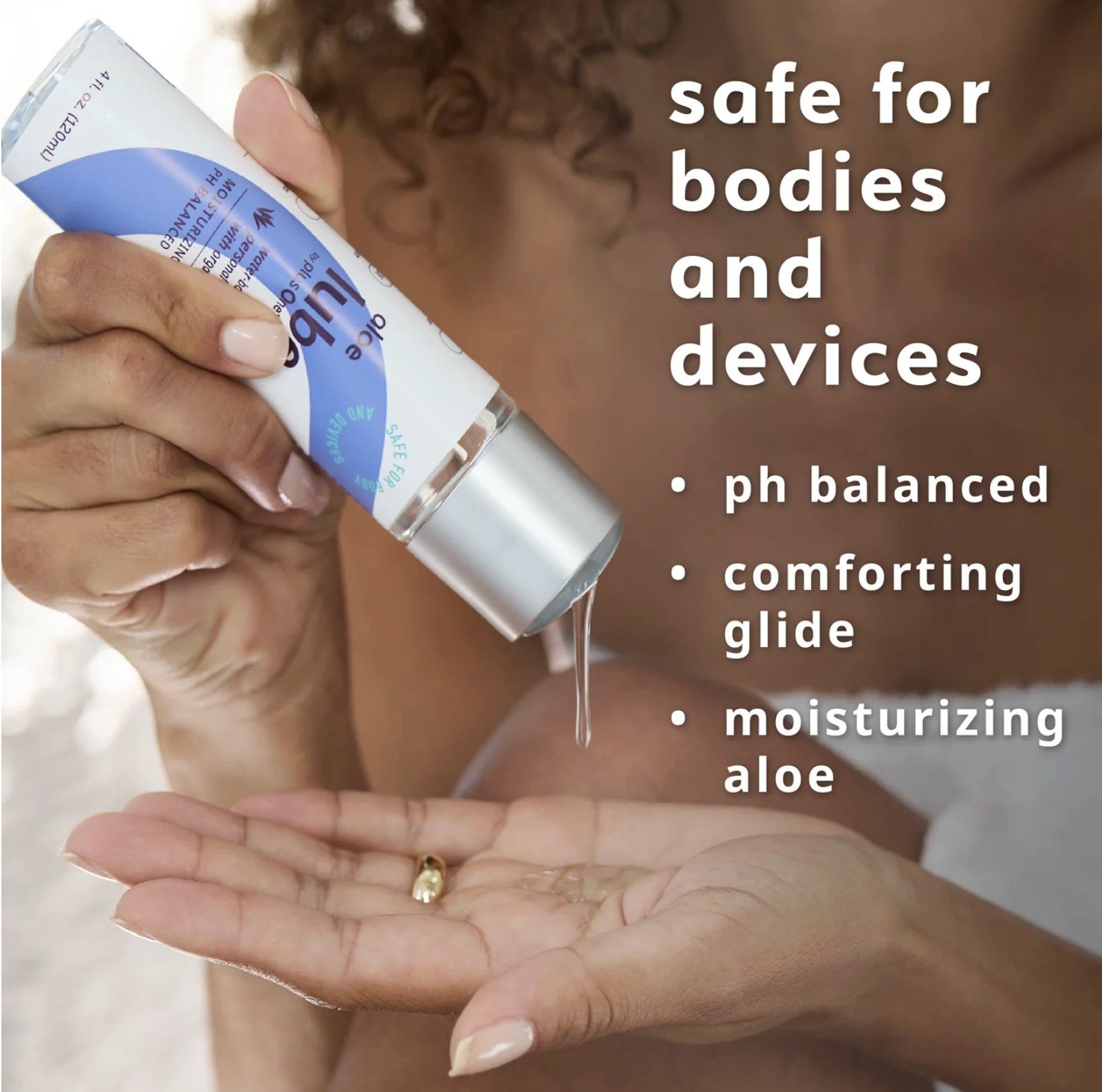 plusOne Aloe Glide Personal Lubricant in one hand being poured onto another hand