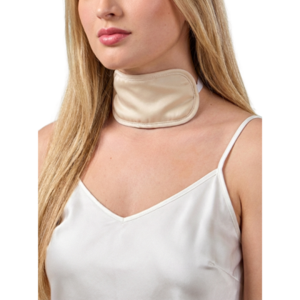 Castor Oil Pack for Thyroid placed on a women