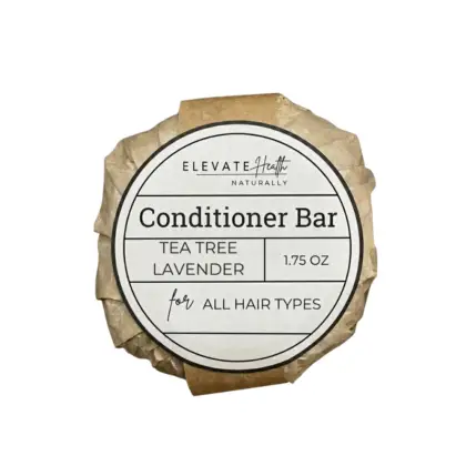 conditioner bar tea tree lavender in a brown kraft paper wrap showing the product label