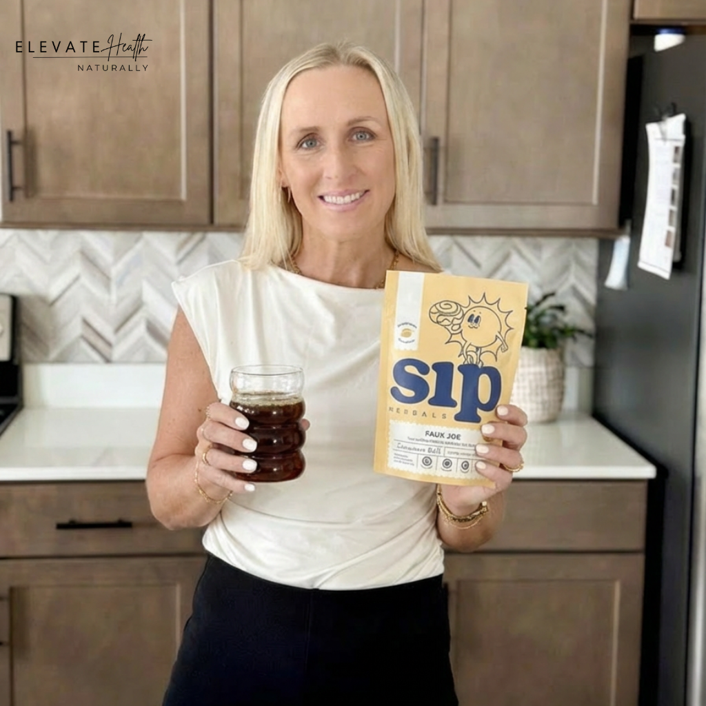 woman holding glass of coffee alternative Sip Herbals