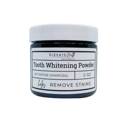 Tooth Whitening Powder in a 4oz glass jar showing the product label